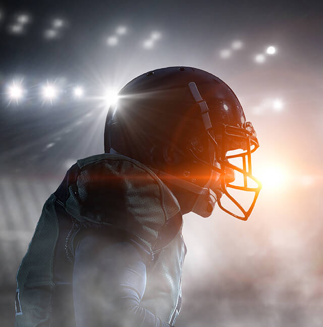 Backlit Photo of Football Player